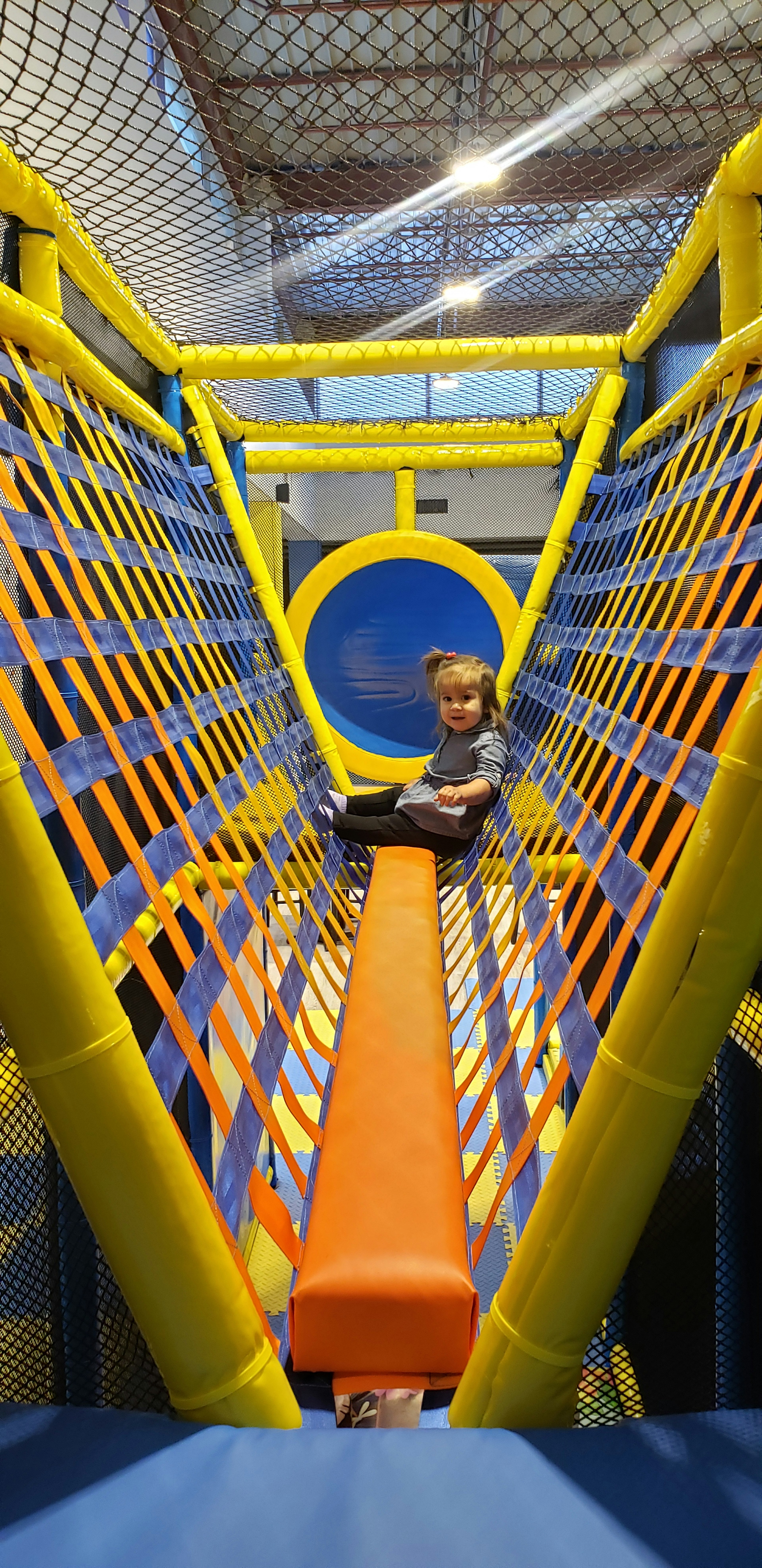 Inside view of the balance beam inside the play structure.