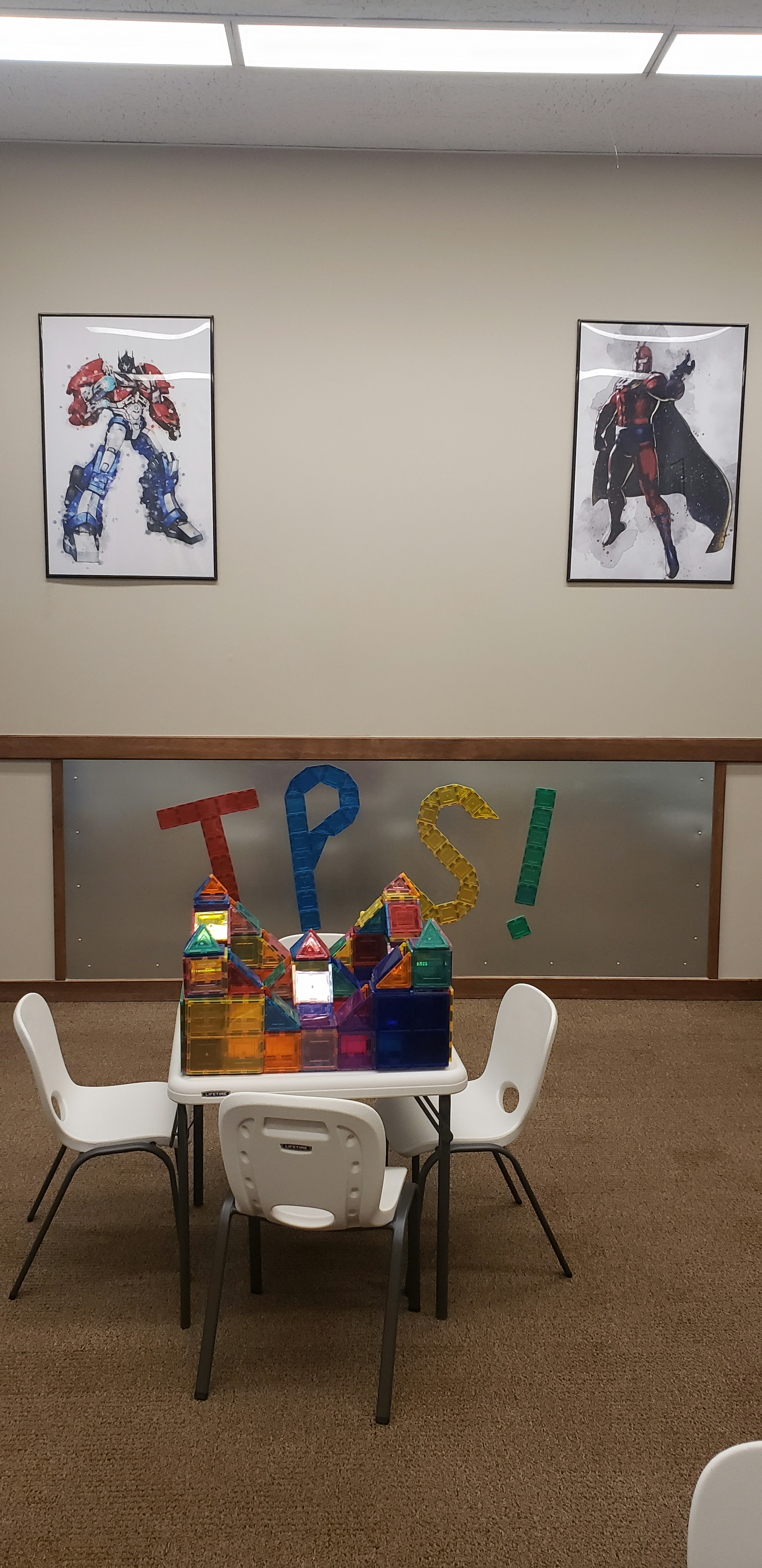 A magnet tile castle constructed in the magnet room.