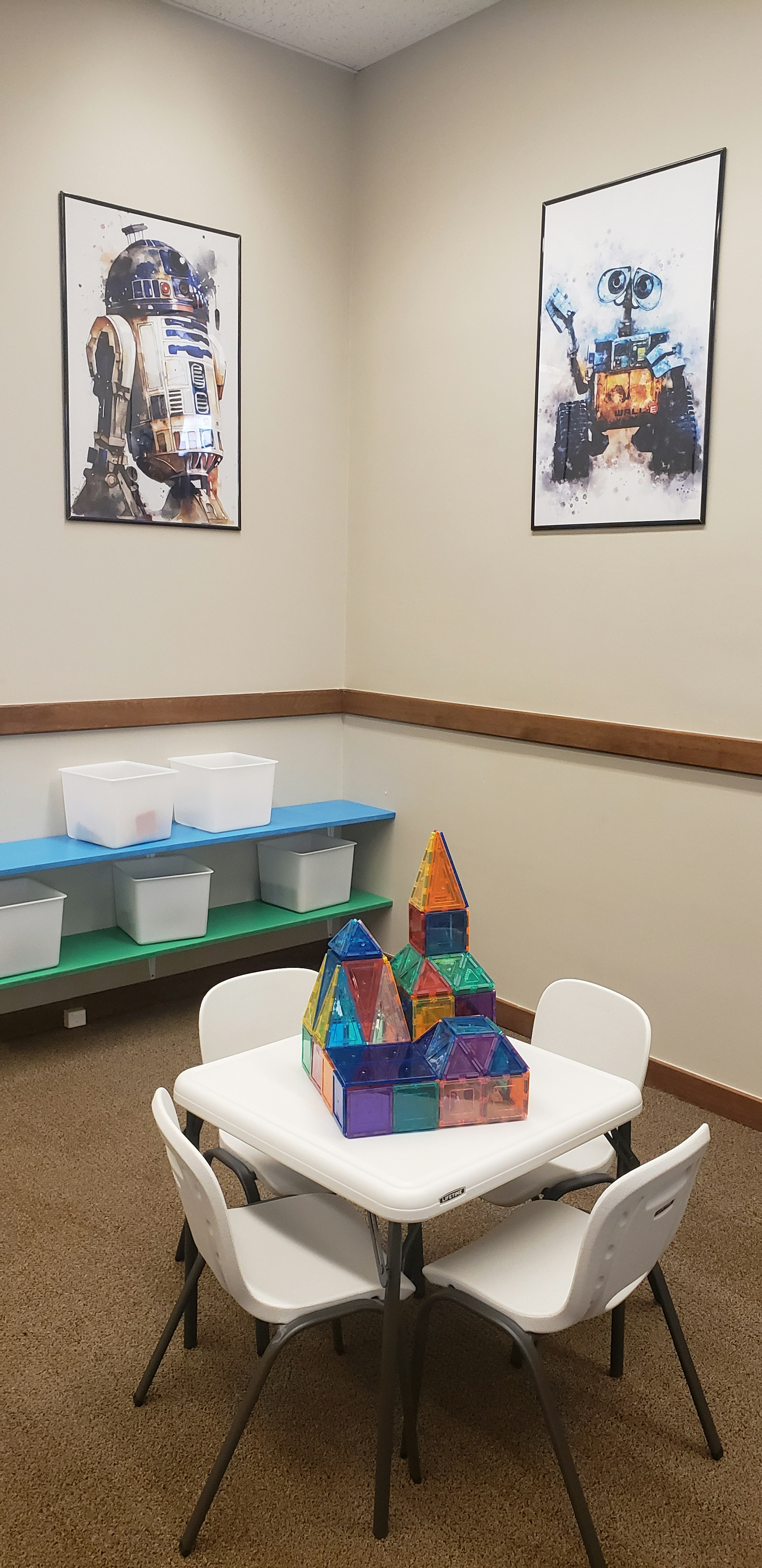 A magnet tile castle constructed in the magnet room.